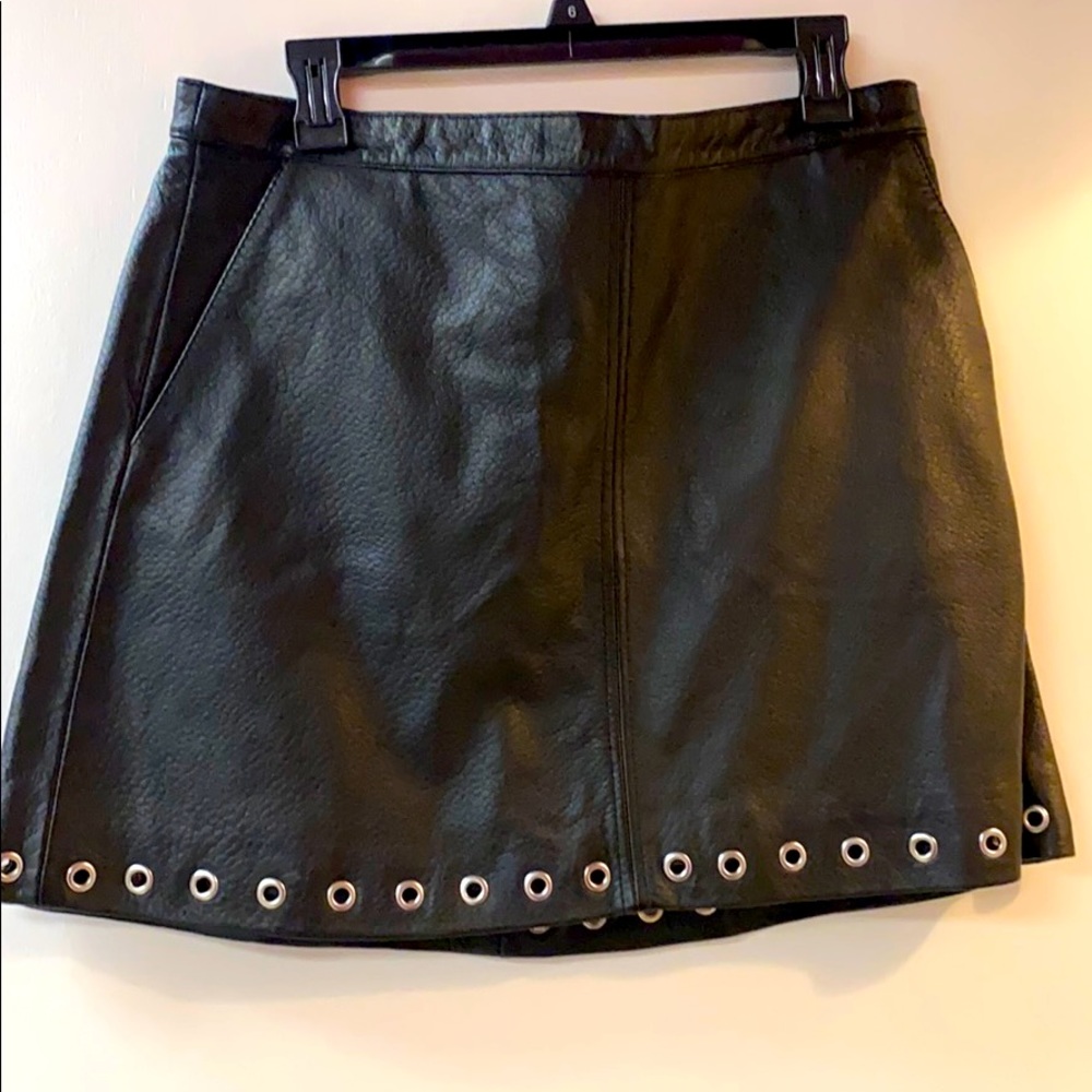 Short skirt with metal detail